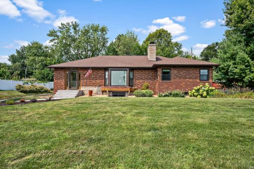 Wonderful landscaping plus updated roof and windows!