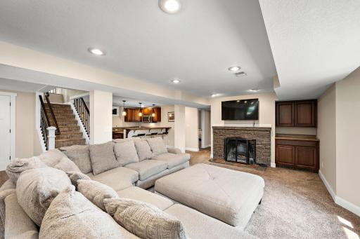 Another brick fireplace and some built-in storage!