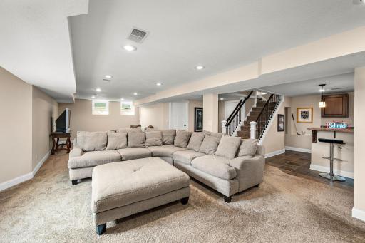 The lower level is also wide open and enjoys lots of natural light!