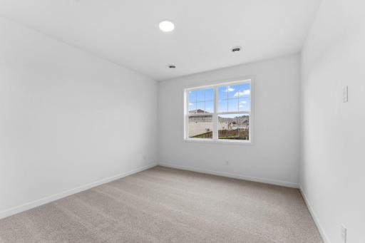 The ownerâs suite enjoys a private location at the back of the home, complete with a restful bedroom, an en-suite bathroom and a walk-in closet.