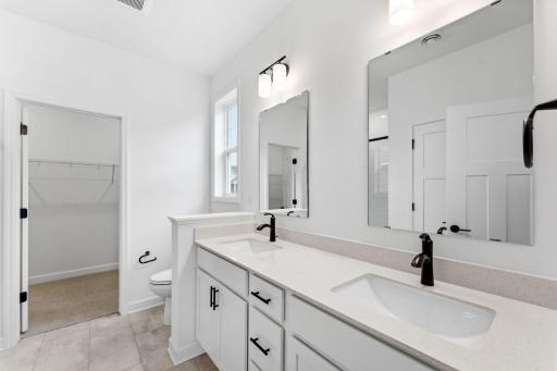 Convenient dual sinks promote a streamlined morning routine