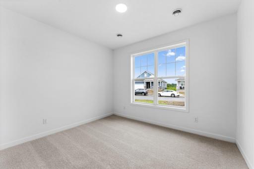 The bedrooms are private and comfortable spaces within the home, each offering convenient closet storage.