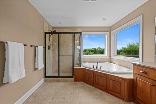 Tile flooring and separate shower/tub.