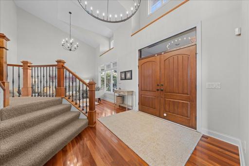 Grand 2 story vaulted foyer area.