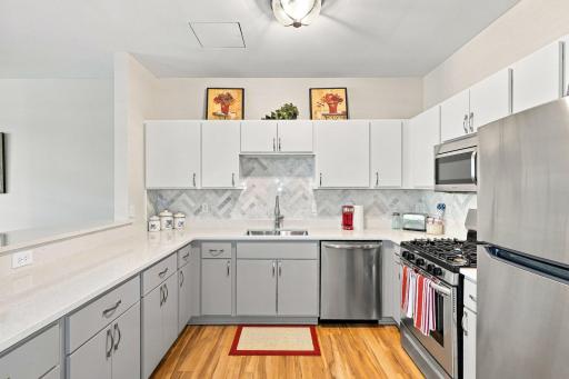 Photo for 2803 E 38th Street, 305, Minneapolis, MN 55406 - listing #7125494 Beautifly updated airy open concept kitchen with newer stainless steele appliances