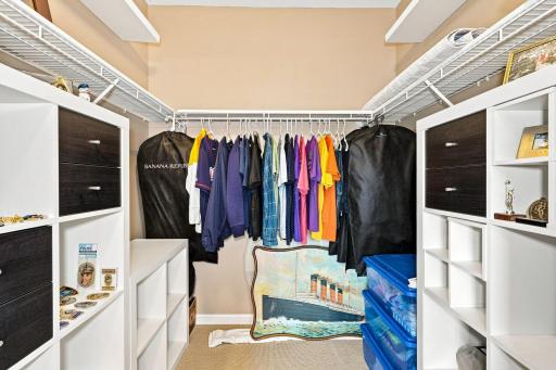 Huge walk-in closet in bedroom