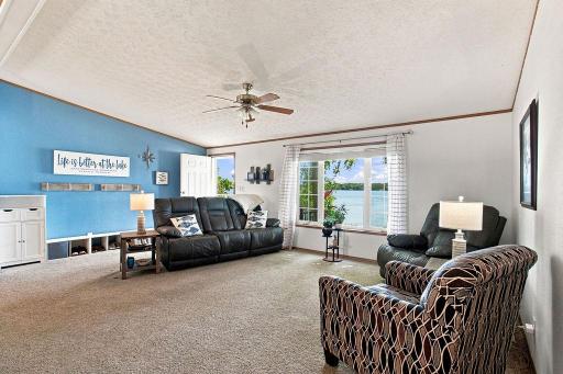 Large Living Room with Picture Window and south-facing views of the lake.