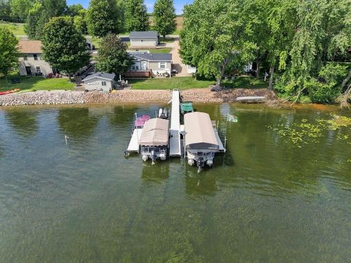 Sellers are currently sharing a dock with the neighbor to the west, which is common on this side of the lake. Sellers will stack their platforms separately at the end of the season.
