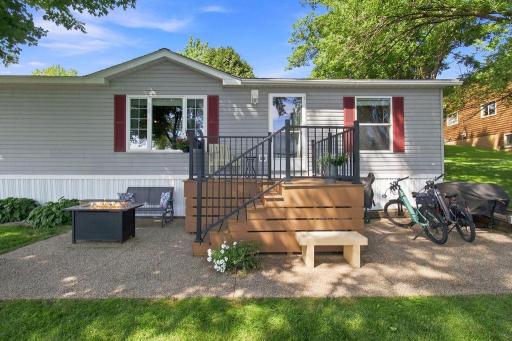 Maintenance-free decking with aggregate patio relatively new. Walk right out to the water from your 3BD, 2BA cabin on beautiful Lake Manuella. Dock will stay and home can come furnished.