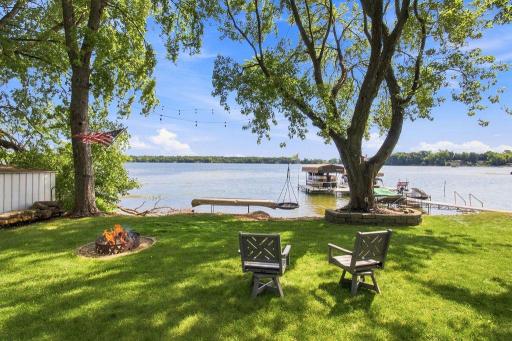 Walk right out to the water from your 3BD, 2BA cabin on beautiful Lake Manuella. Dock will stay and inside furnishings are negotiable.