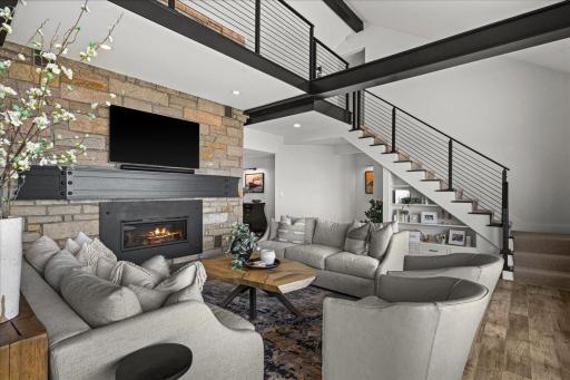 A distinctive nod to the Iron Range, the reimagined staircase pairs bold iron railings with the home’s original stone and warm natural materials, creating a striking architectural moment that feels both rooted in place and decidedly contemporary.