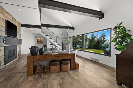 Designed to live in conversation with Lake Superior, this inviting living space captures expansive water views through generous windows, creating an effortless connection to the ever-changing North Shore landscape.