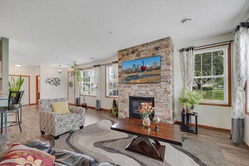 Beautiful family room with stone gas fireplace.
