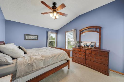 Primary bedroom also boasts lots of sunlight.
