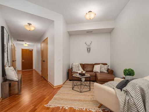 The den provides a respite for a cozy, relaxing conversational or reading space or utilize the space as a home office