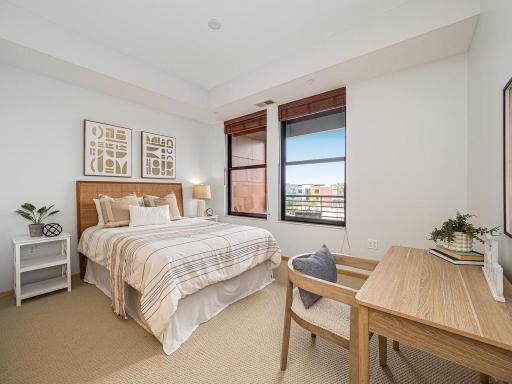 The large second bedroom with its southern exposures is bright and airy.