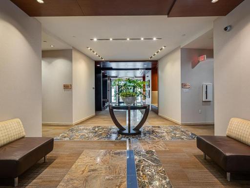 Proudly welcome your friends and family to The Grand Condominiums - lobby entrance