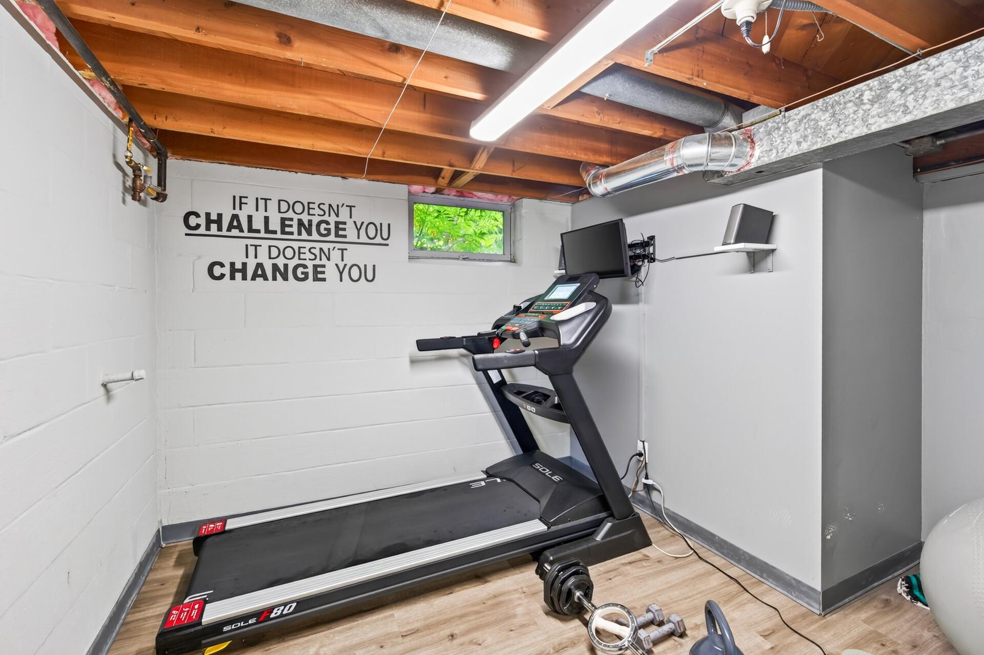 Workout room in the laundry/mechanical room