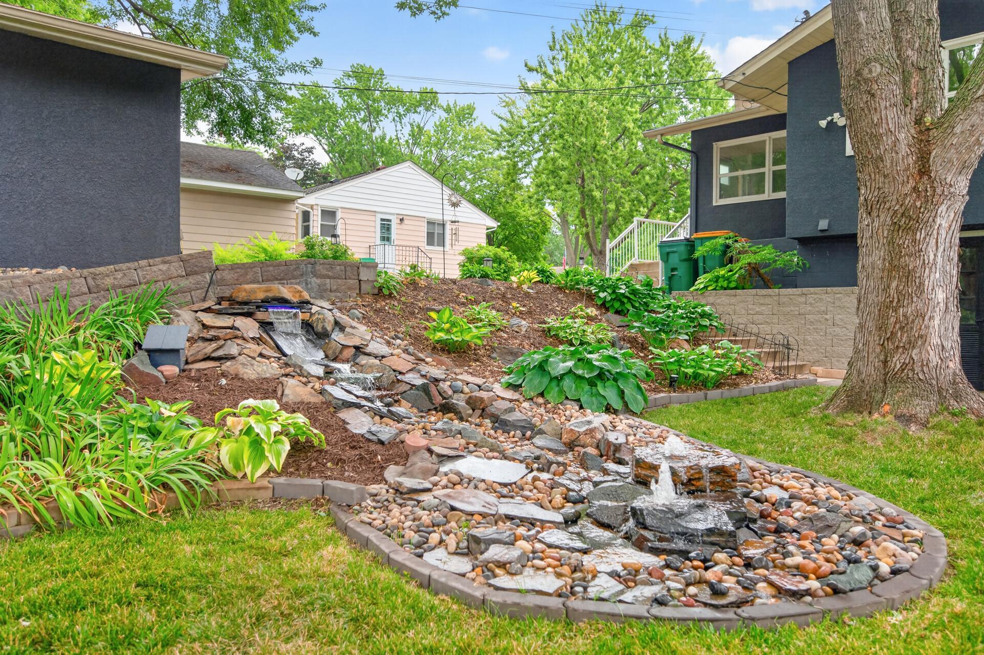 Backyard oasis, complete with a waterfall feature