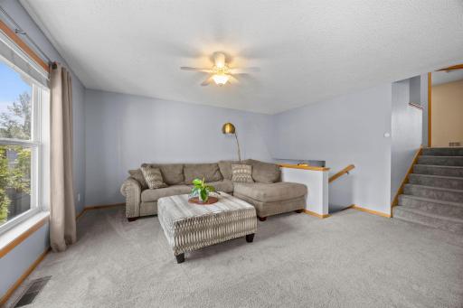 The main level welcomes you with an open floor plan filled with natural light.