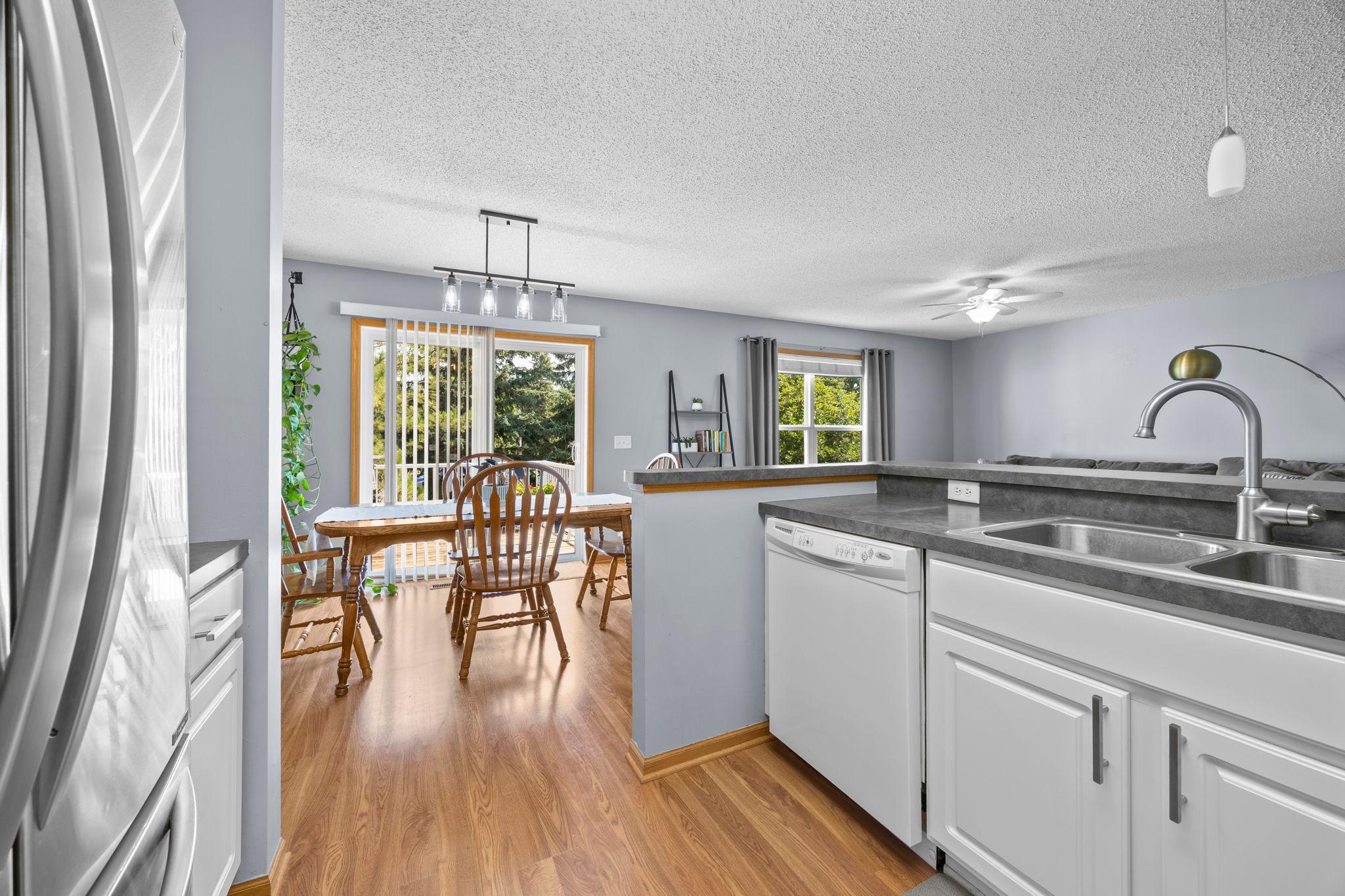Enjoy a large peninsula with breakfast bar seating, and a cabinet pantry to keep everything organized.