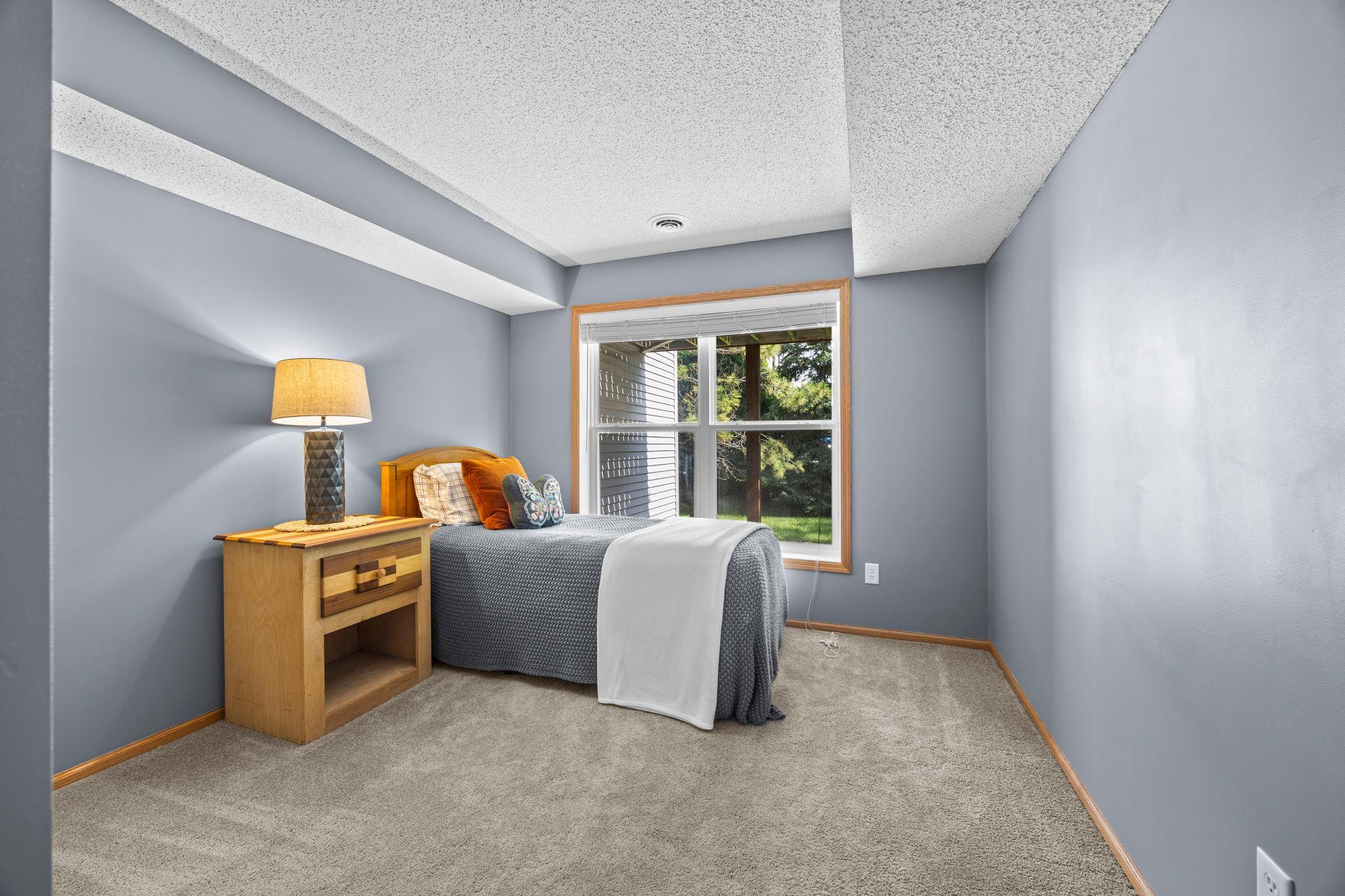 A third bedroom makes this level especially versatile, whether used for guests, a home office, workout space, hobbies, or simply relaxing.