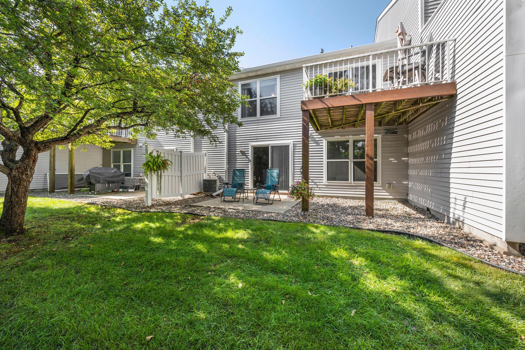 One of the standout features is the rare combination of both a private deck and patio.