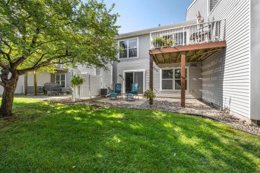 One of the standout features is the rare combination of both a private deck and patio.