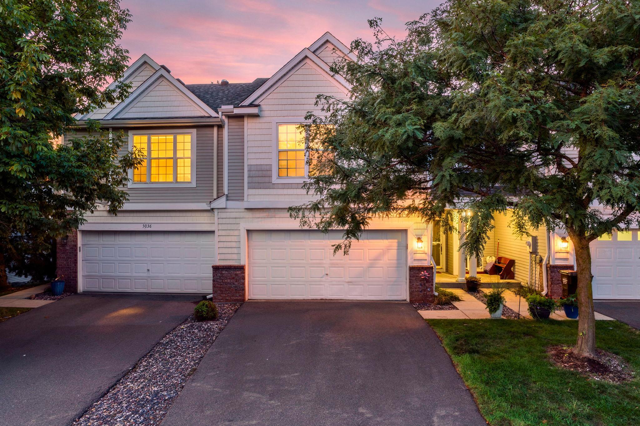 Thoughtful updates include furnace and washer/dryer (around 2022), water heater (around 2019), new driveway (around 2023), new roof (around 2020), updated carpet, interior paint, kitchen sink, microwave, refrigerator and various lighting throughout.