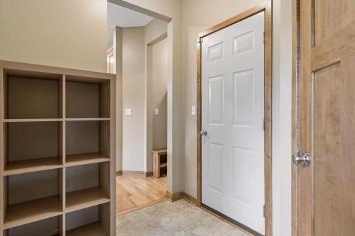 Mudroom with storage and walk in pantry for kitchen
