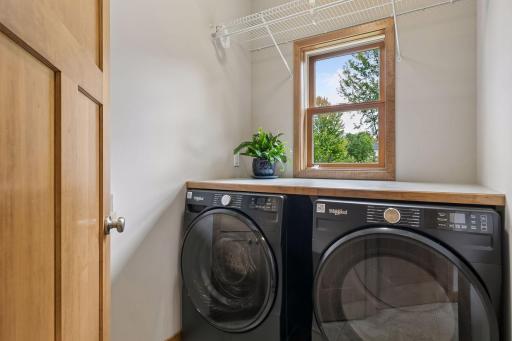 Laundry room has a sink (opposite side to the washer and dryer, not shown in photo)