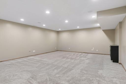 Huge lower level family room with built in speaker system