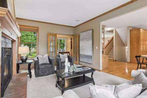 living room to a home office with French doors