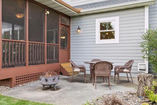 Concrete patio right outside of the screen porch