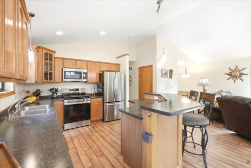 Vaulted ceilings create a voluminous, airy feel, enhancing the sense of space and openness.