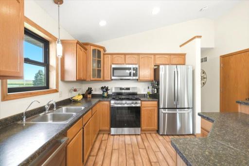New stainless steel appliance suite (2026) includes refrigerator, range, and microwave, complemented by a new dishwasher installed in 2025.