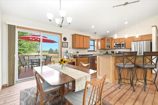 Enjoy casual breakfast-bar seating or gather for a more formal dinner in the dining area—both spaces are open, inviting, and perfectly suited for entertaining larger groups.