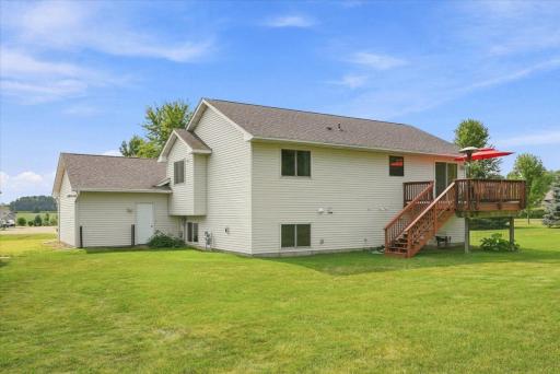 Rear veiw of home with updated deck.
