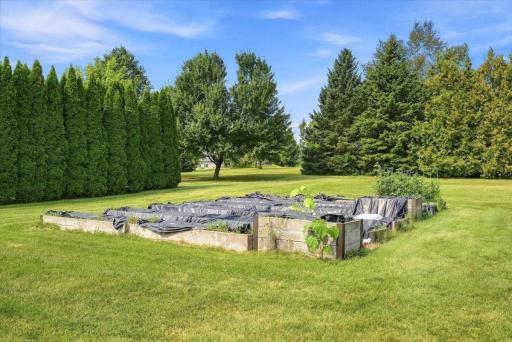 Garden beds await the adventurous home gardener, offering the opportunity to grow your own endless bounty of fresh, healthy produce.