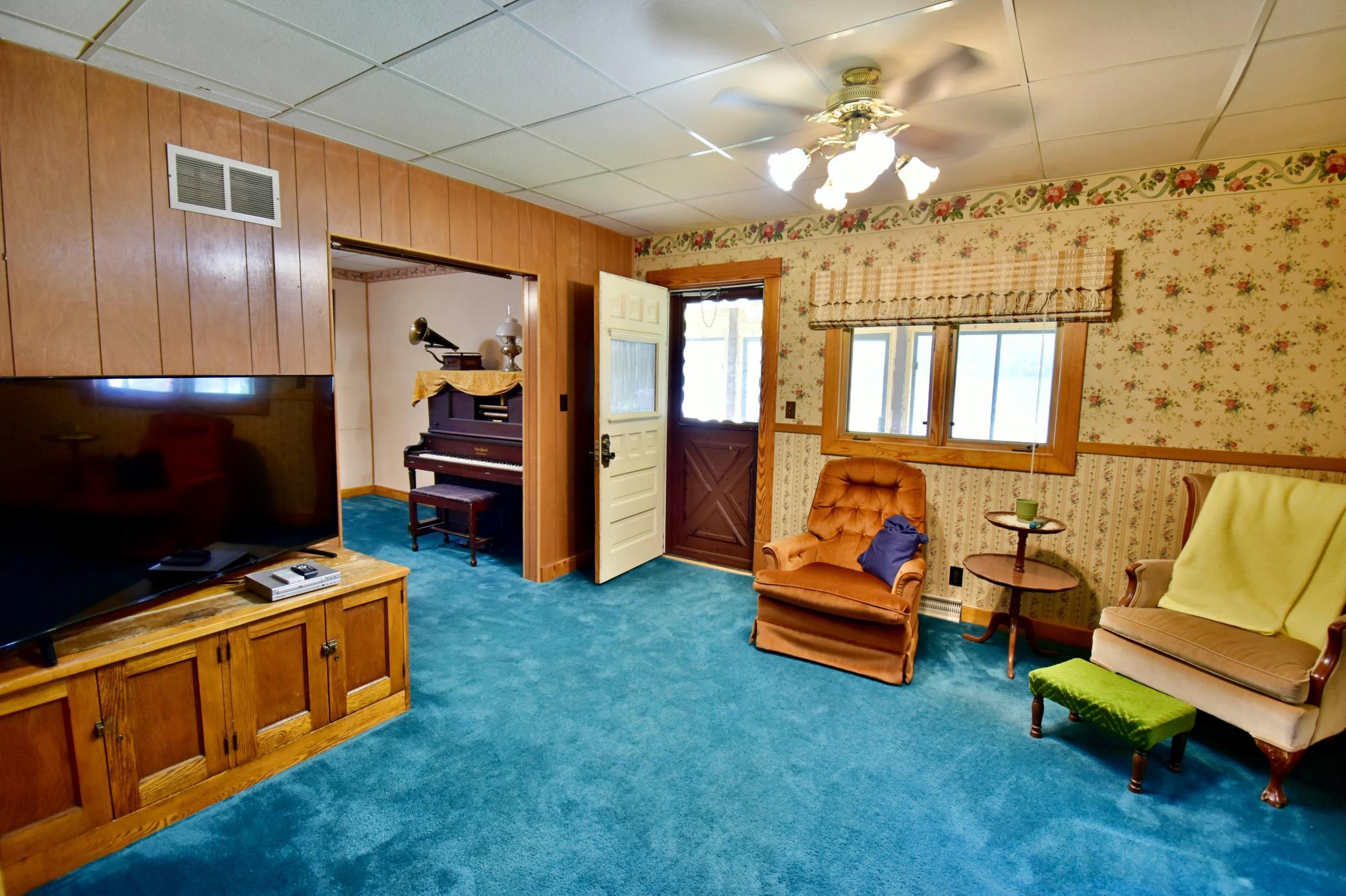 Just outside the living room is your 3 season porch!