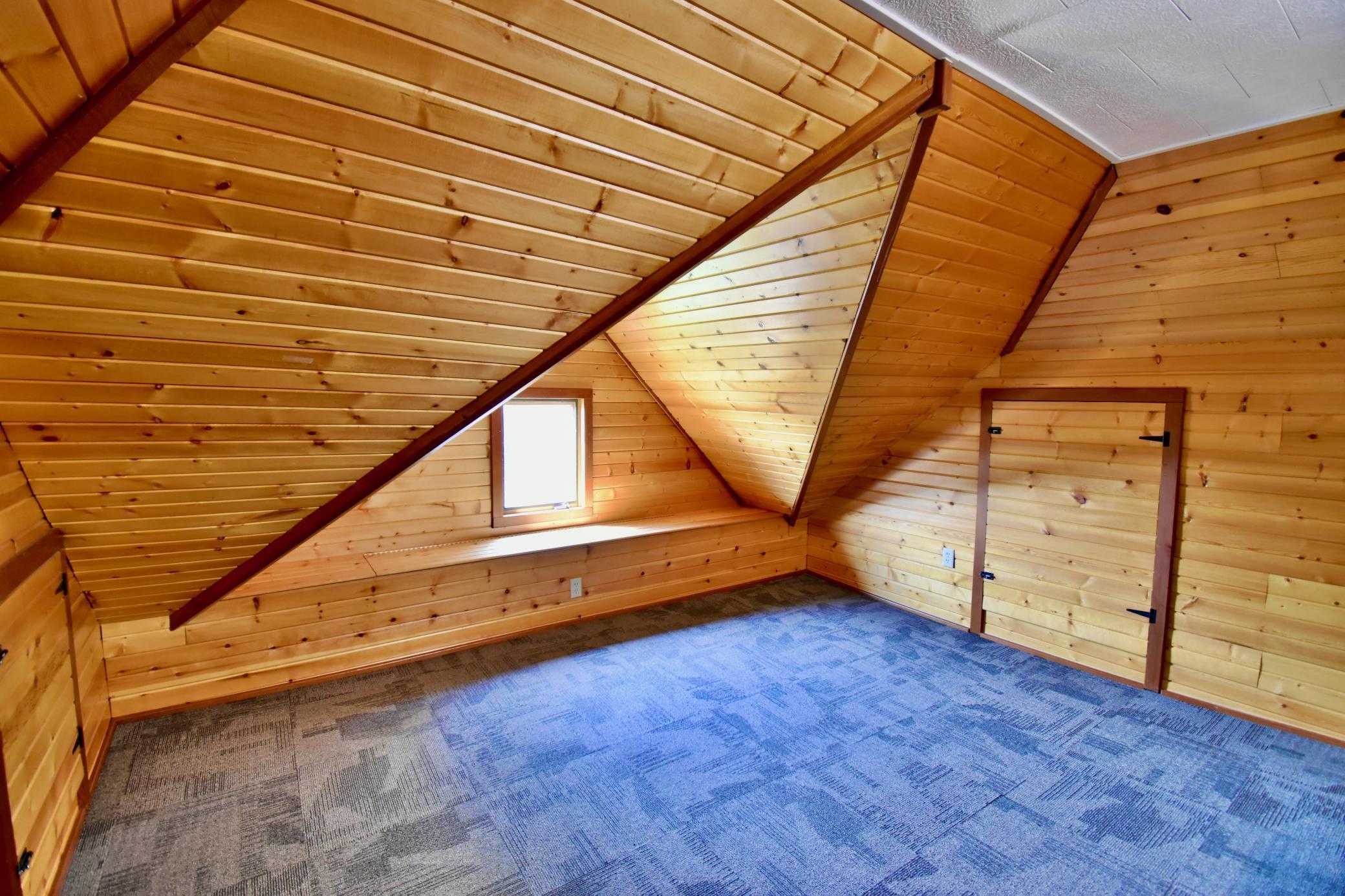 This would make a great space for an office, a quiet reading area, or a great play space. Maybe perhaps a crafting or sewing area too!