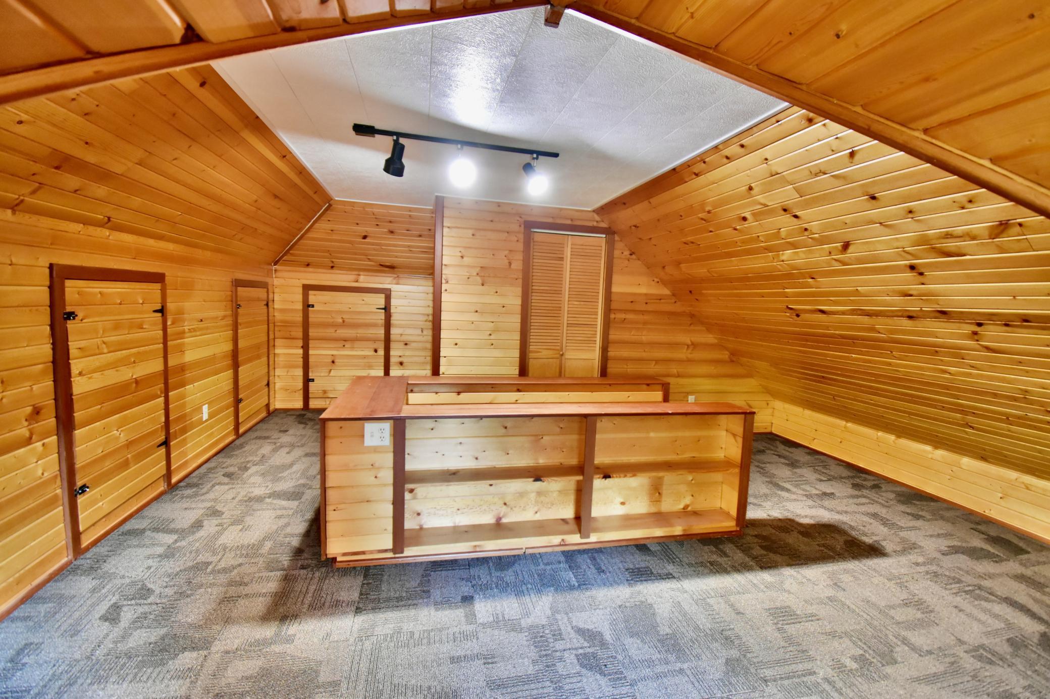 Built in bookshelves and lots of hidden storage areas here