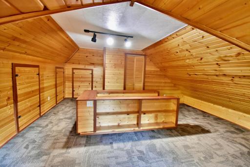 Built in bookshelves and lots of hidden storage areas here