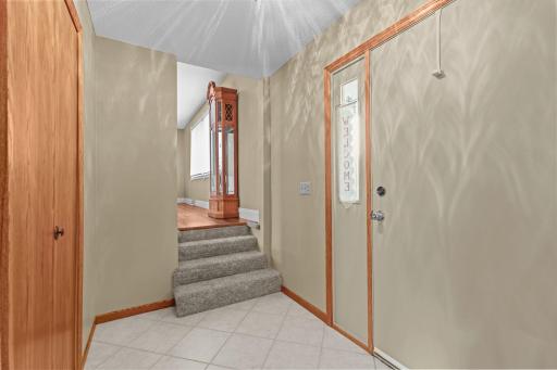 Front entryway with tiled floors