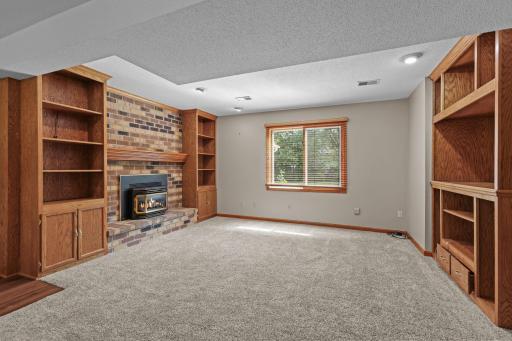 Gas fireplace in bright family room