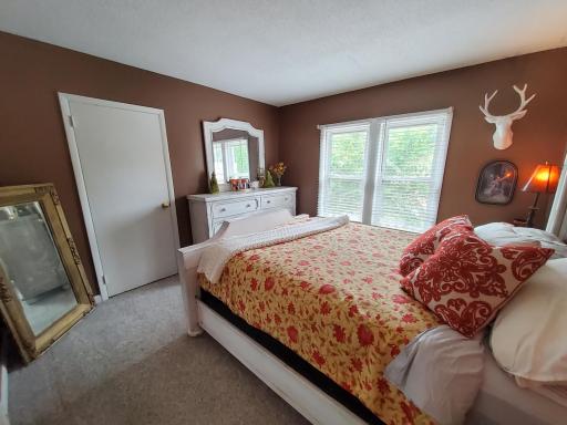 Large windows with walk-in closet