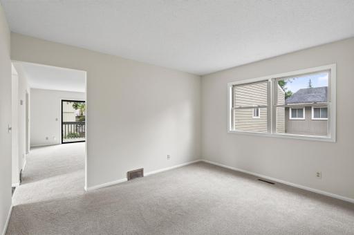 Versatile bonus room perfect for a home office, craft room, or formal dining space