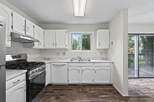 Updated kitchen with brand-new stainless steel appliances and new countertops