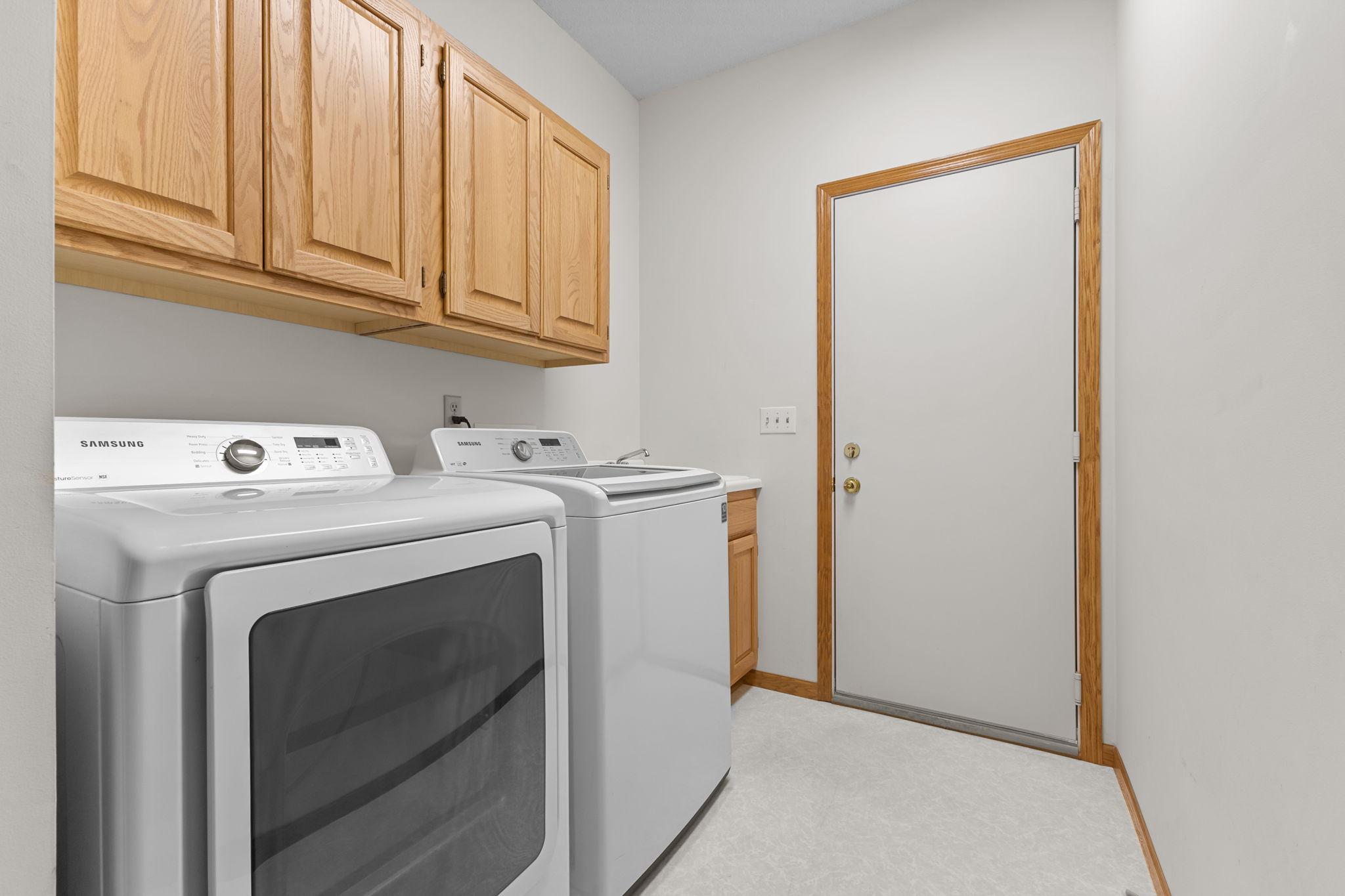 Additional cabinetry and convenient access to the garage.