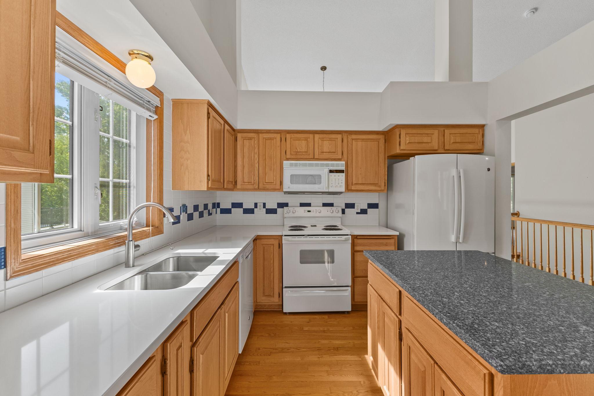 Plenty of workspace and storage throughout.